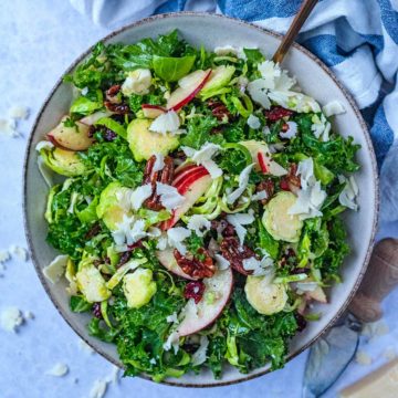 Kale and Brussels Sprout Salad in a large round bowl.