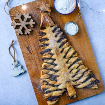 Nutella Puff Pastry Christmas Tree on a wooden serving board.