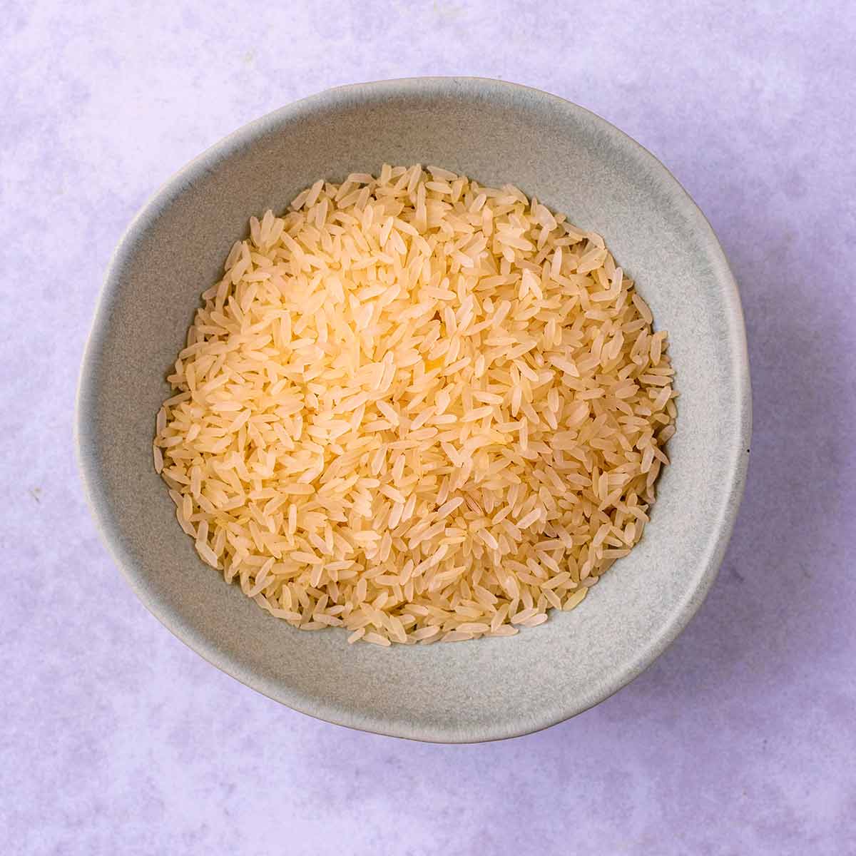 A bowl of uncooked rice.
