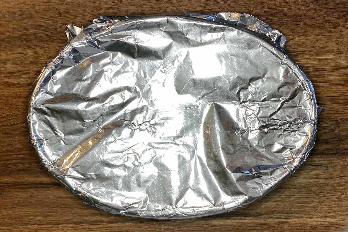 Foil placed over the top of the dish.