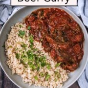 Slow cooker beef curry with a text overlay title.
