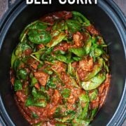 Slow cooker beef curry with a text overlay title.