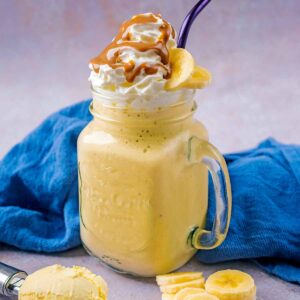 Easy Banana Milkshake in a glass jar.