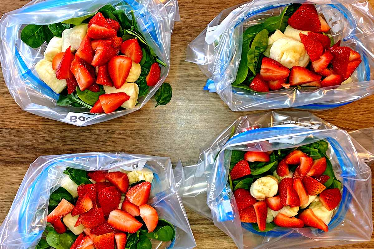 Strawberries added to the bags.