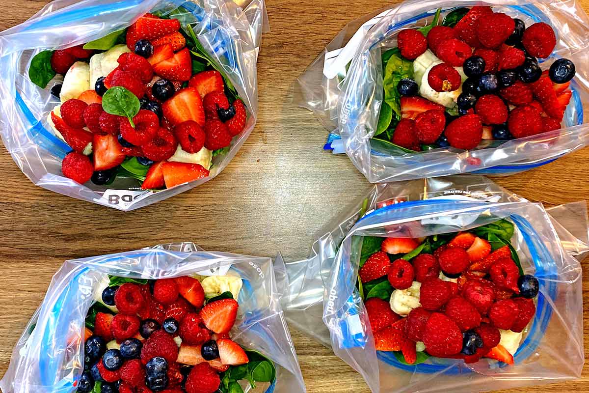 Raspberries and blueberries added to the bags.