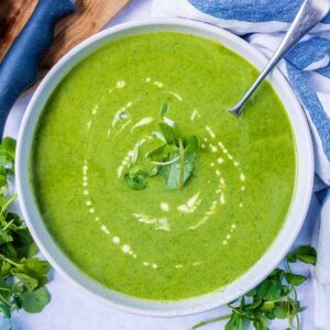 Watercress soup in a large round bowl.