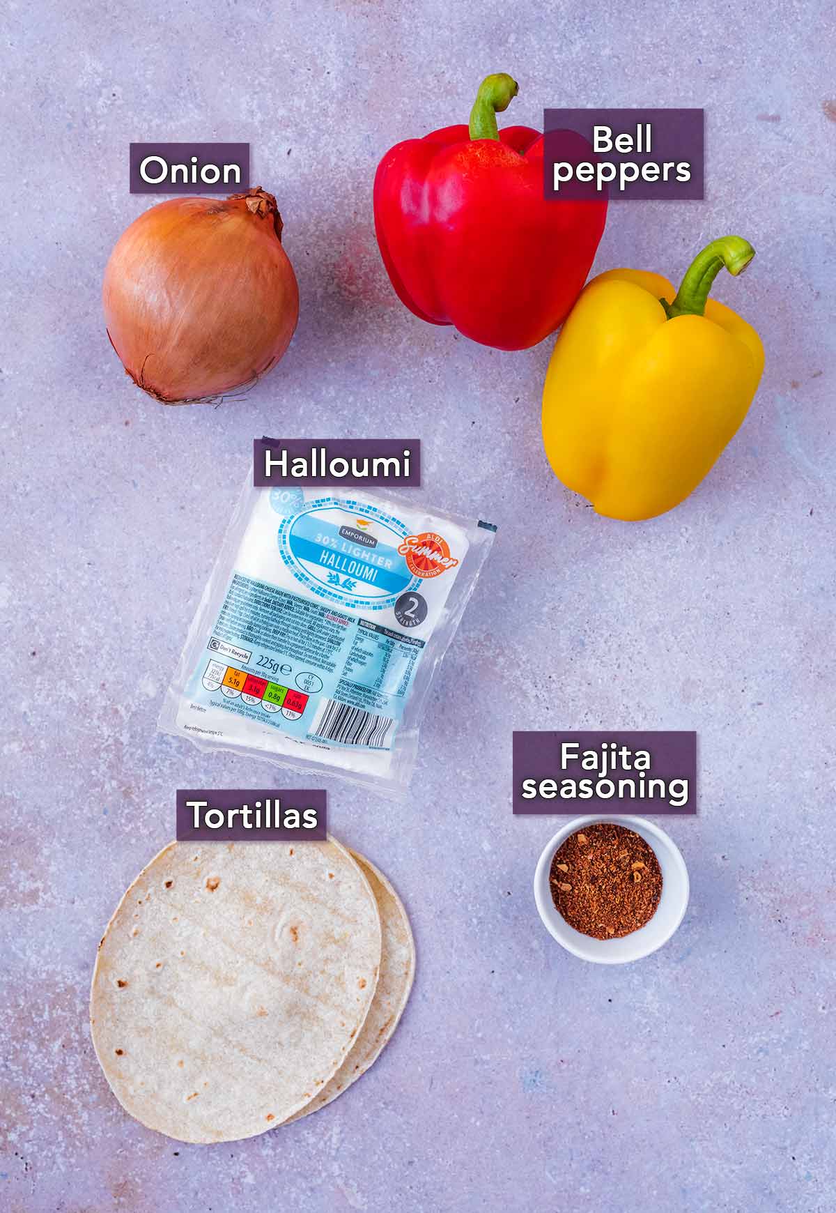 All the ingredients needed to make halloumi fajitas, with text overlay labels.