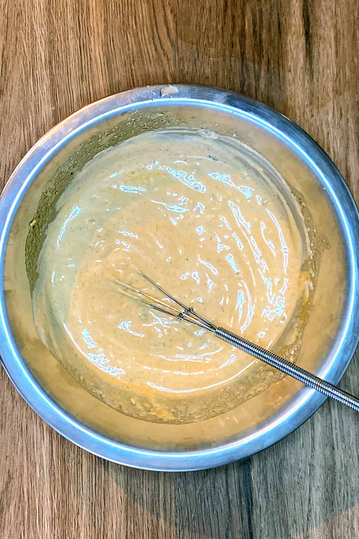 Everything mixed together in the bowl with a whisk.