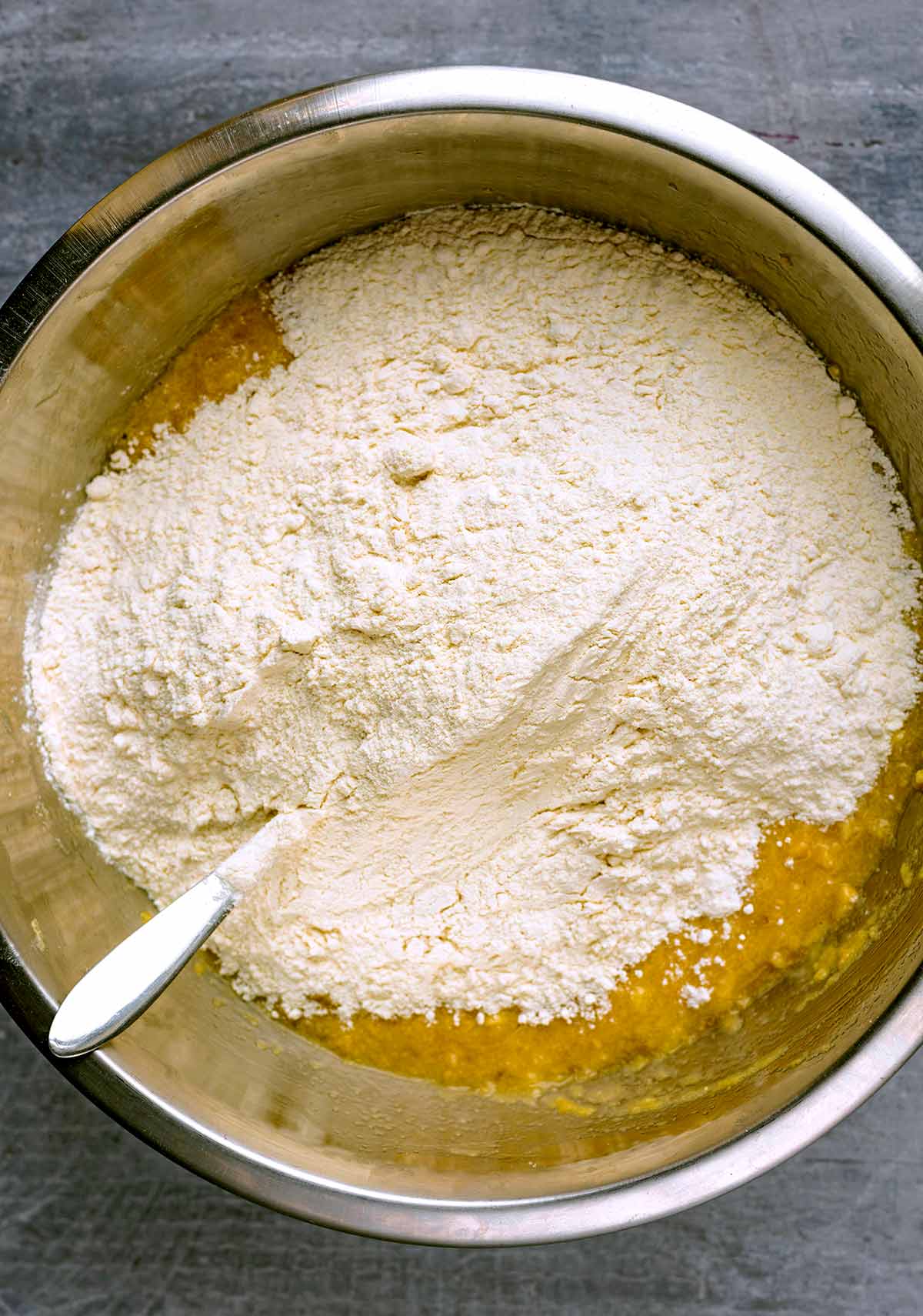 The flour and cinnamon added to the banana mixture.