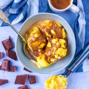 Easy Chocolate Sauce drizzled over some vanilla ice cream.