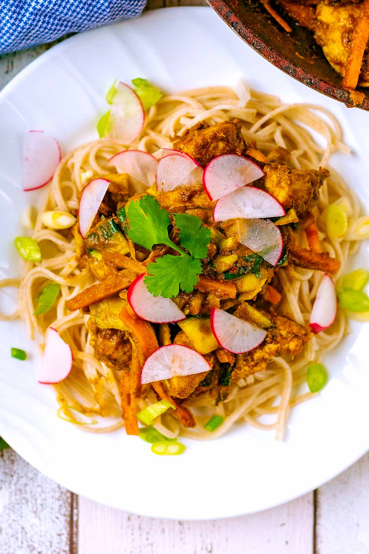 Thai Chicken Noodles served on a plate.