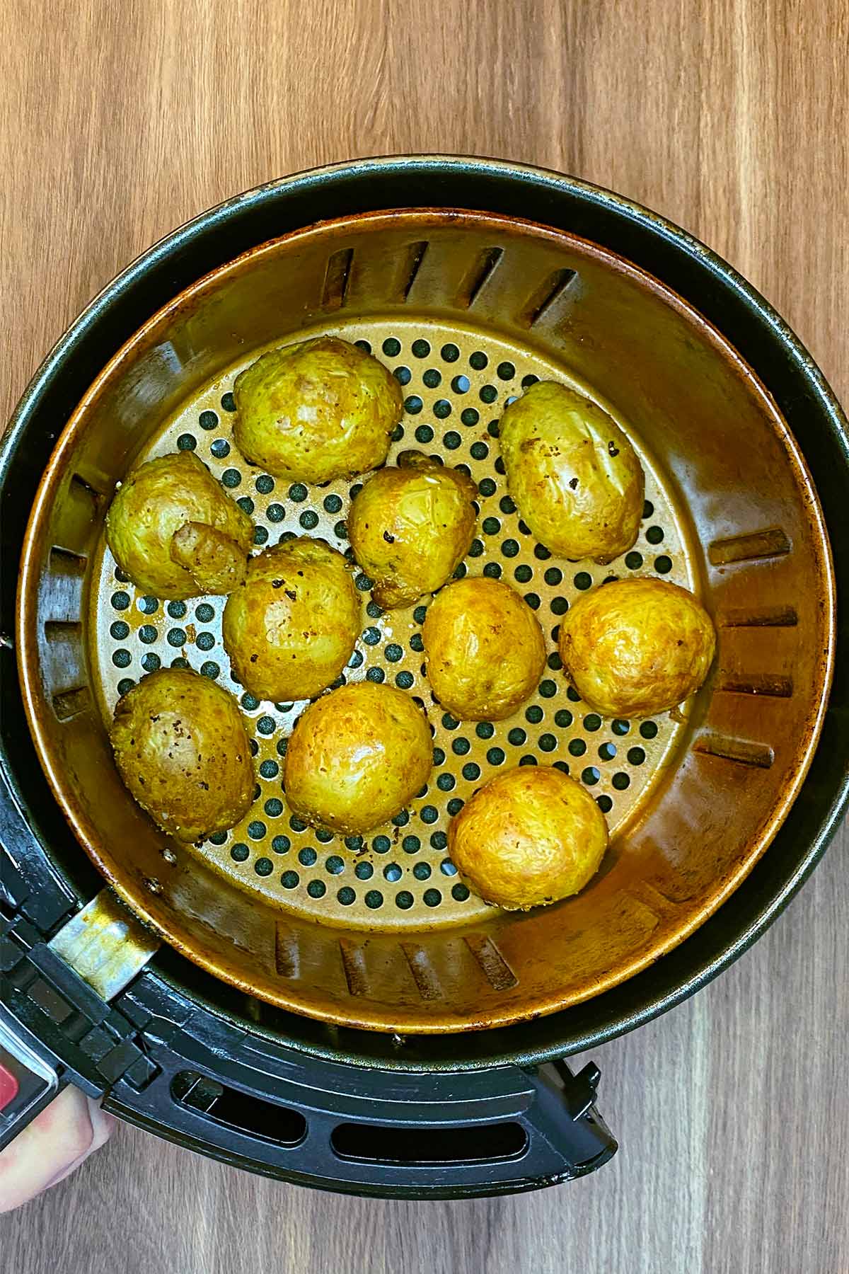 Cooked hasselback potatoes in an air fryer.