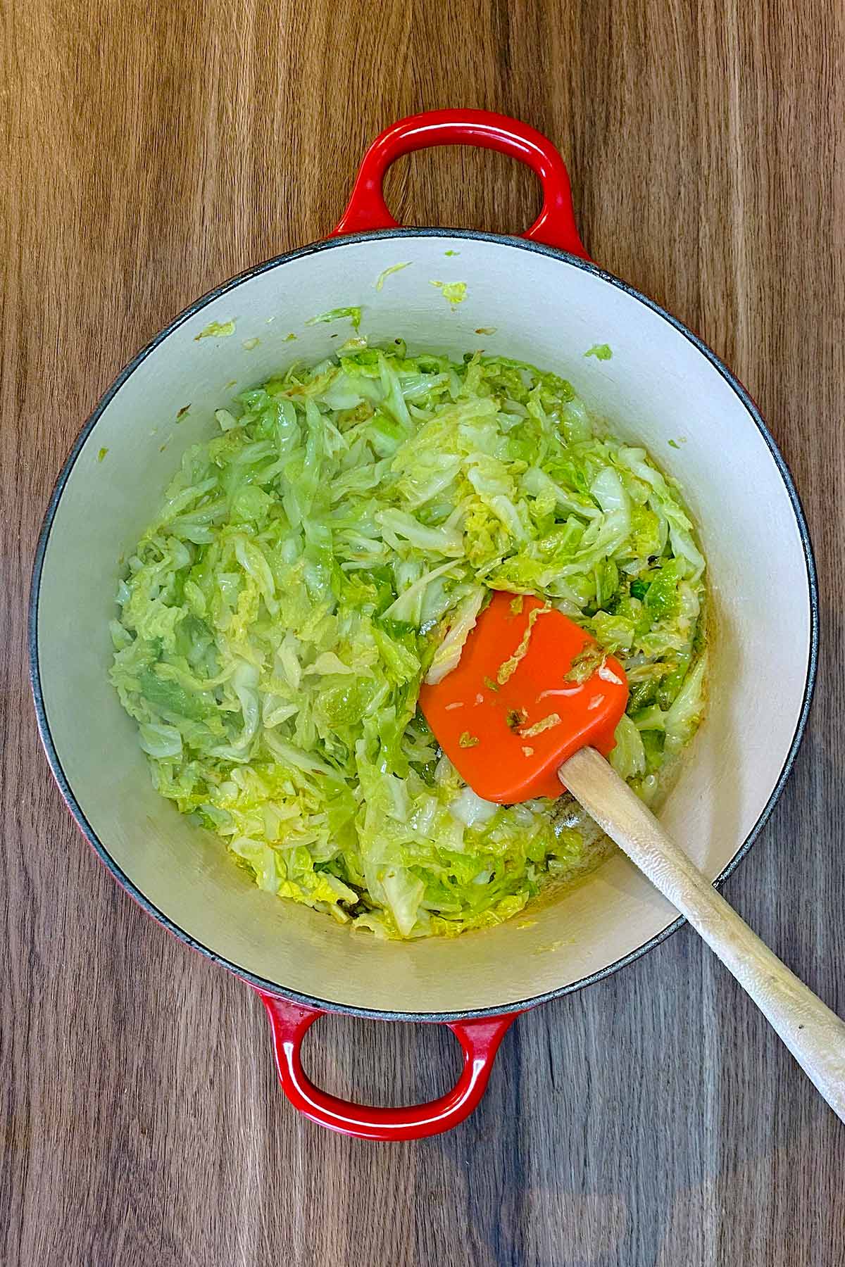 Cooked cabbage in a large pan.