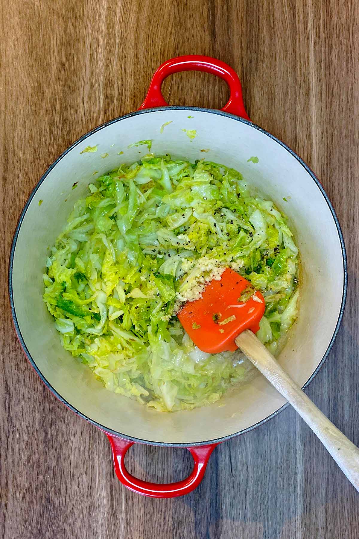 Garlic, salt and pepper and vinegar added to the cooked cabbage.