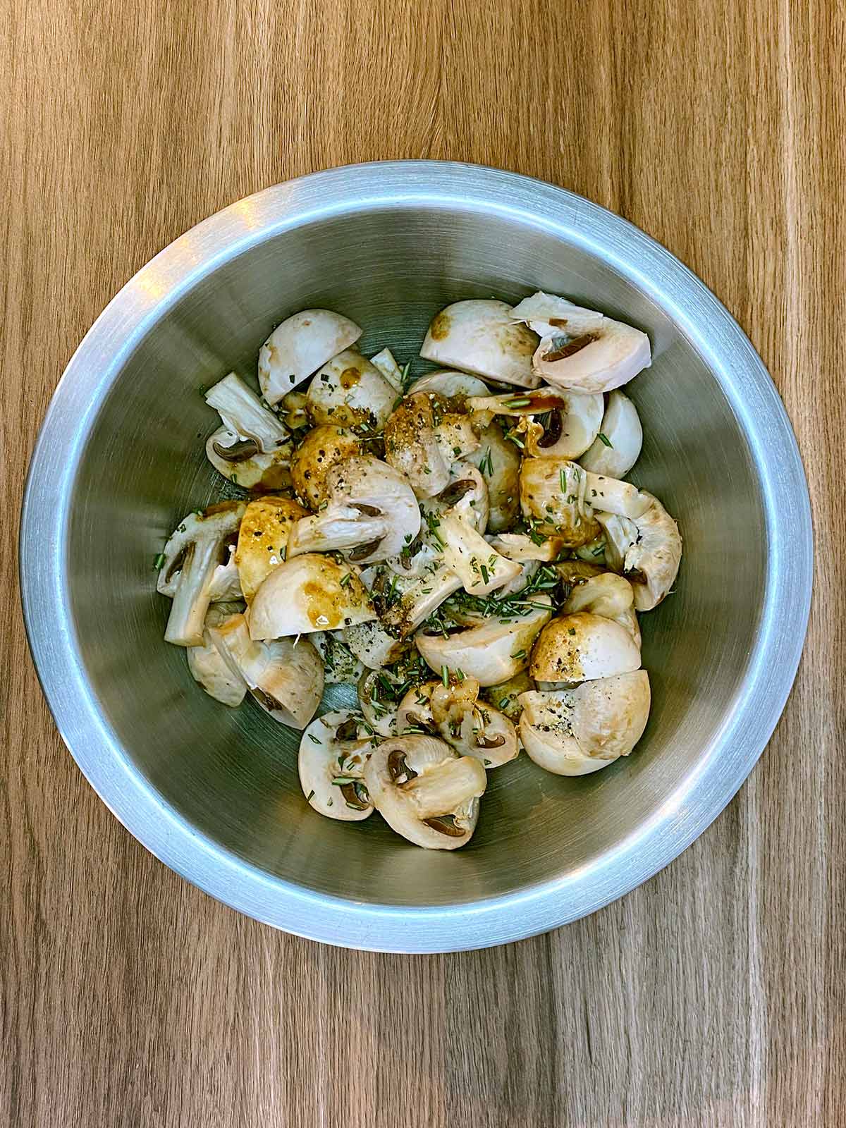 Oil, rosemary and Worcestershire sauce added to the mushrooms.