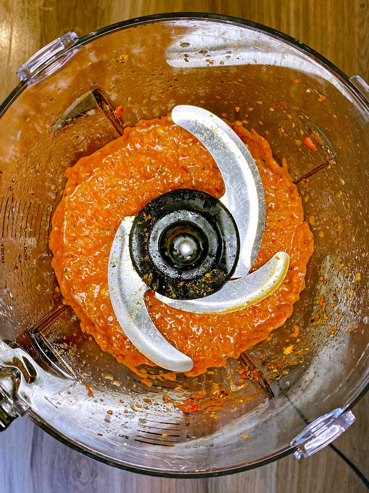 Blended harissa in a food processor.