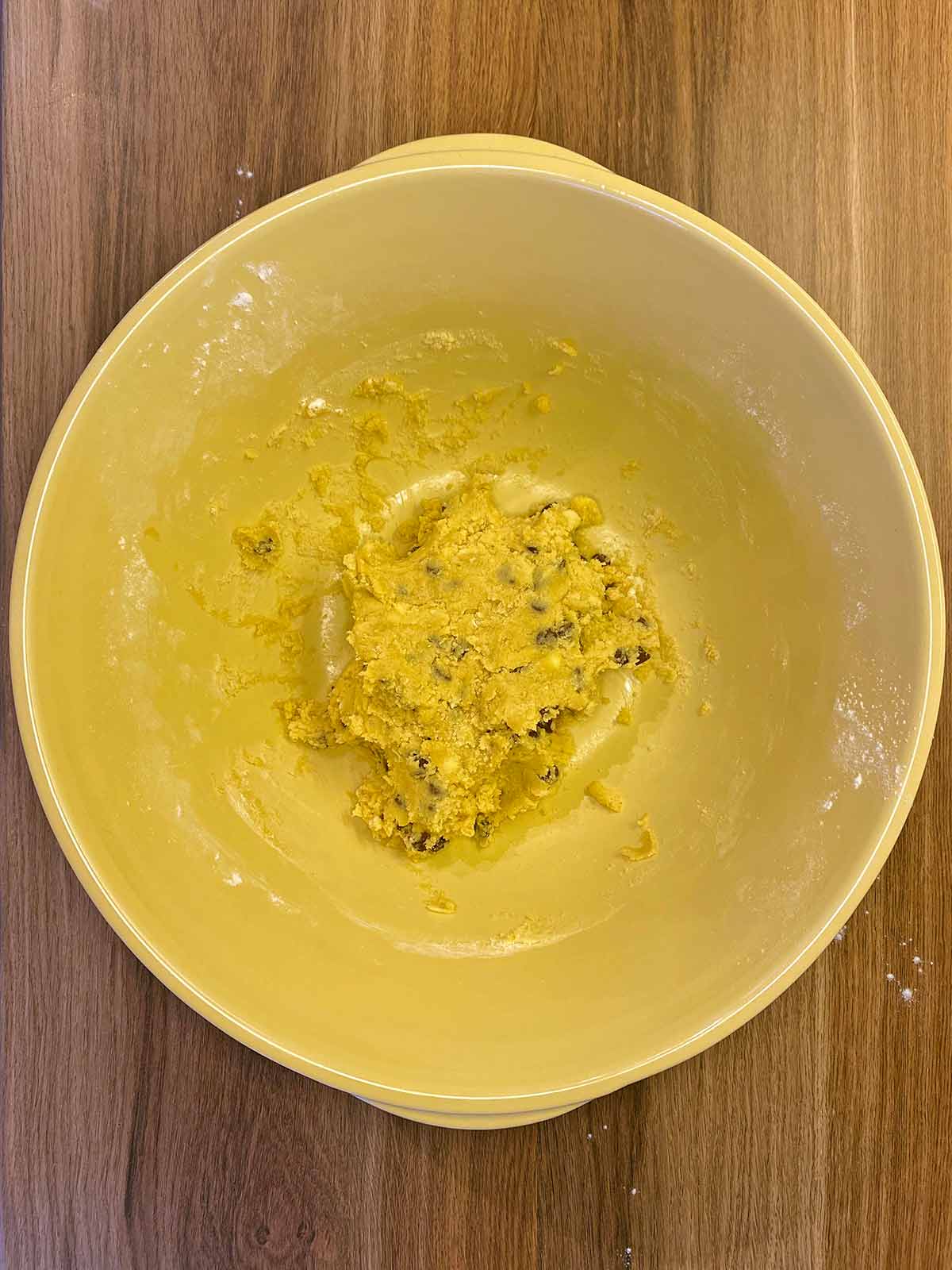 A ball of cookie dough in the bowl.