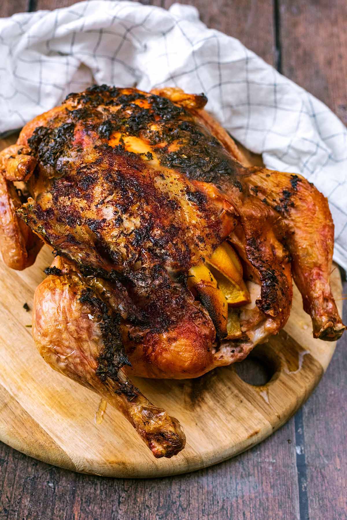 Christmas roast chicken with orange herb butter and crispy golden skin.