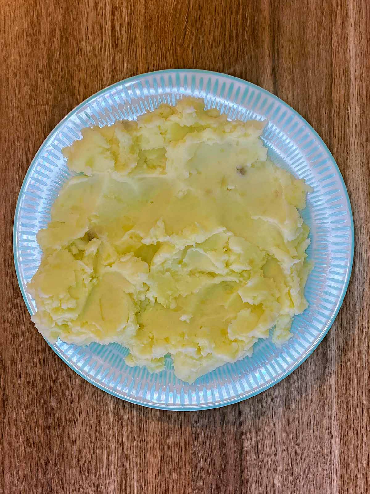 A plate of cold mashed potato.