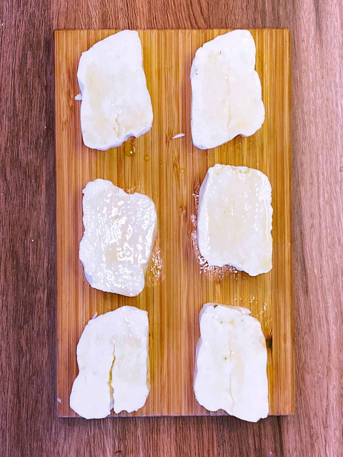 Oil brushed onto the halloumi slices.