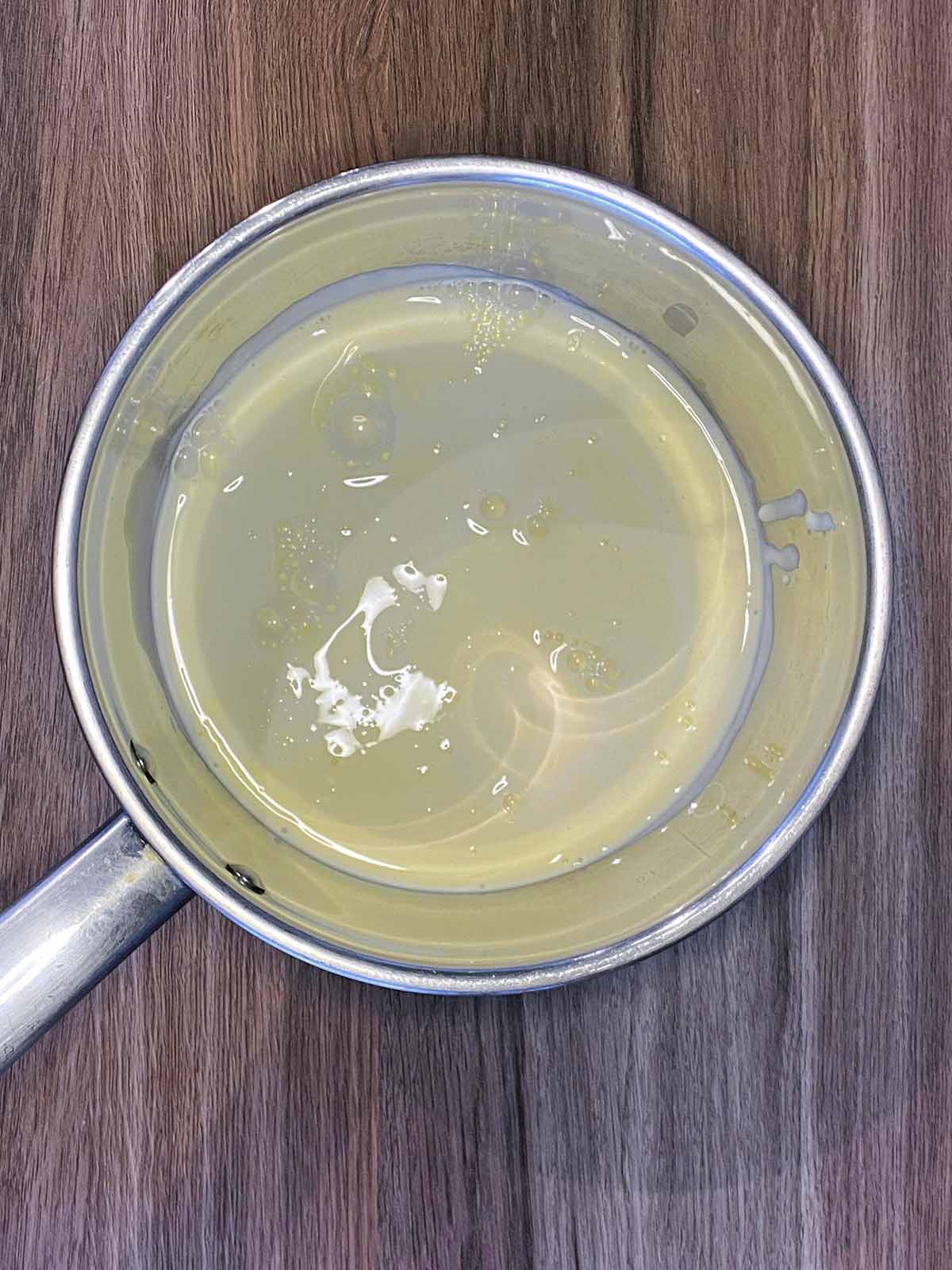 Milk and cream in a saucepan.