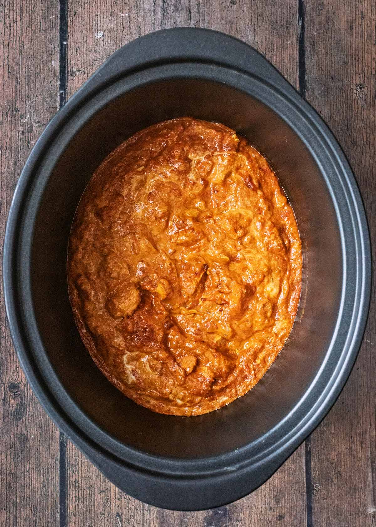 Chicken curry in a slow cooker bowl.