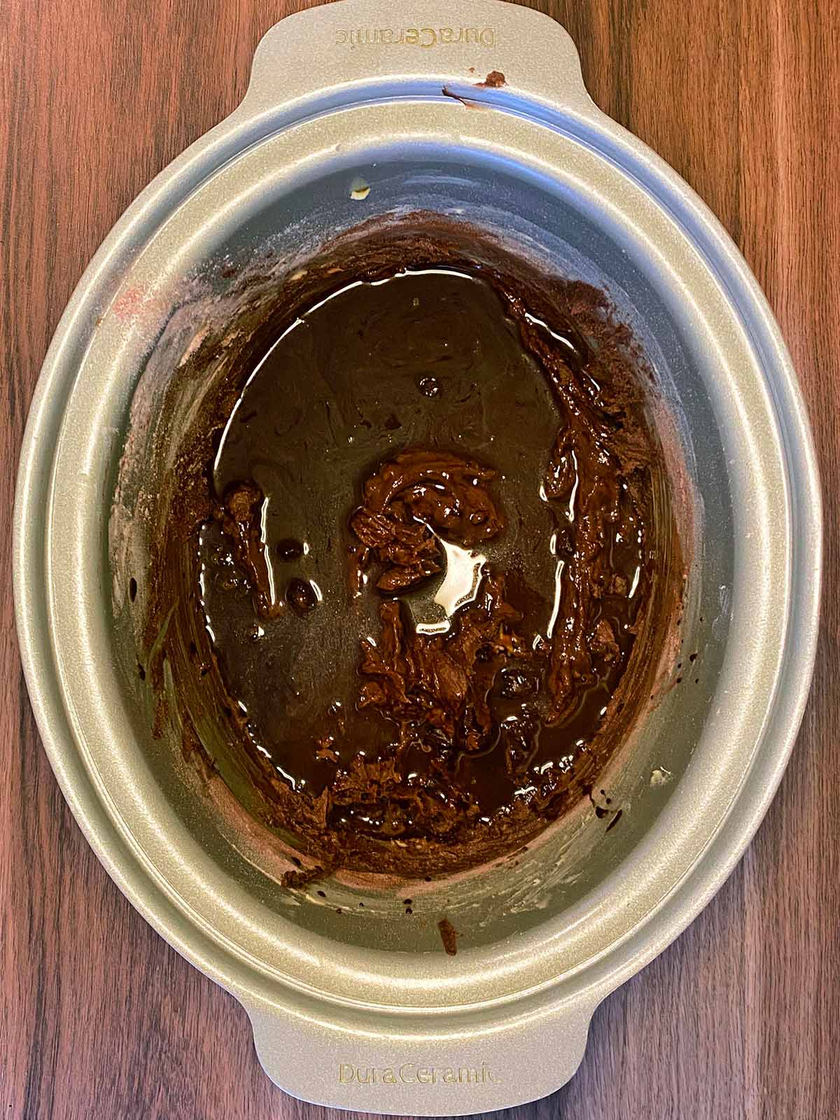 Chocolate sauce poured over the cake batter.