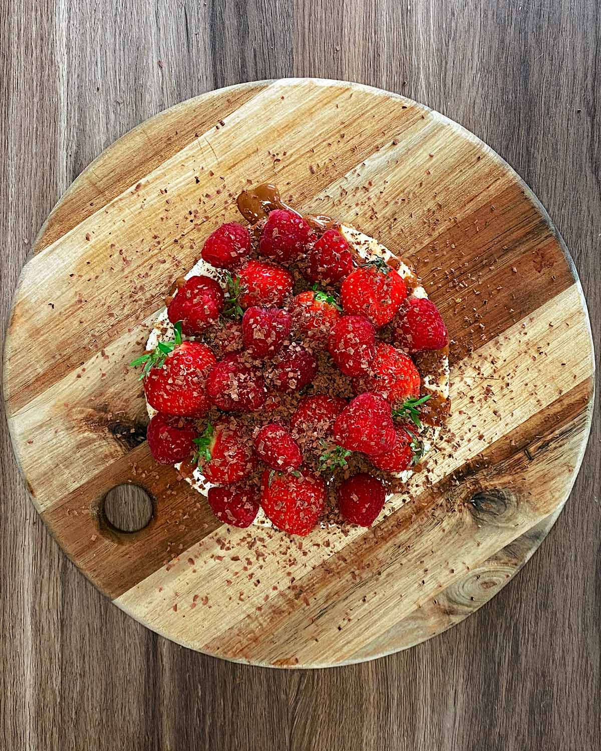 Grated chocolate sprinkled over the berries.