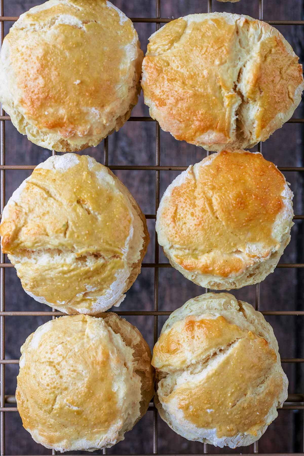 Cooked scones cooling on a wire rack.