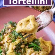 Pesto tortellini with a text title overlay.