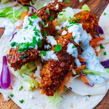 Air Fryer Chicken Tacos on a wooden serving board.