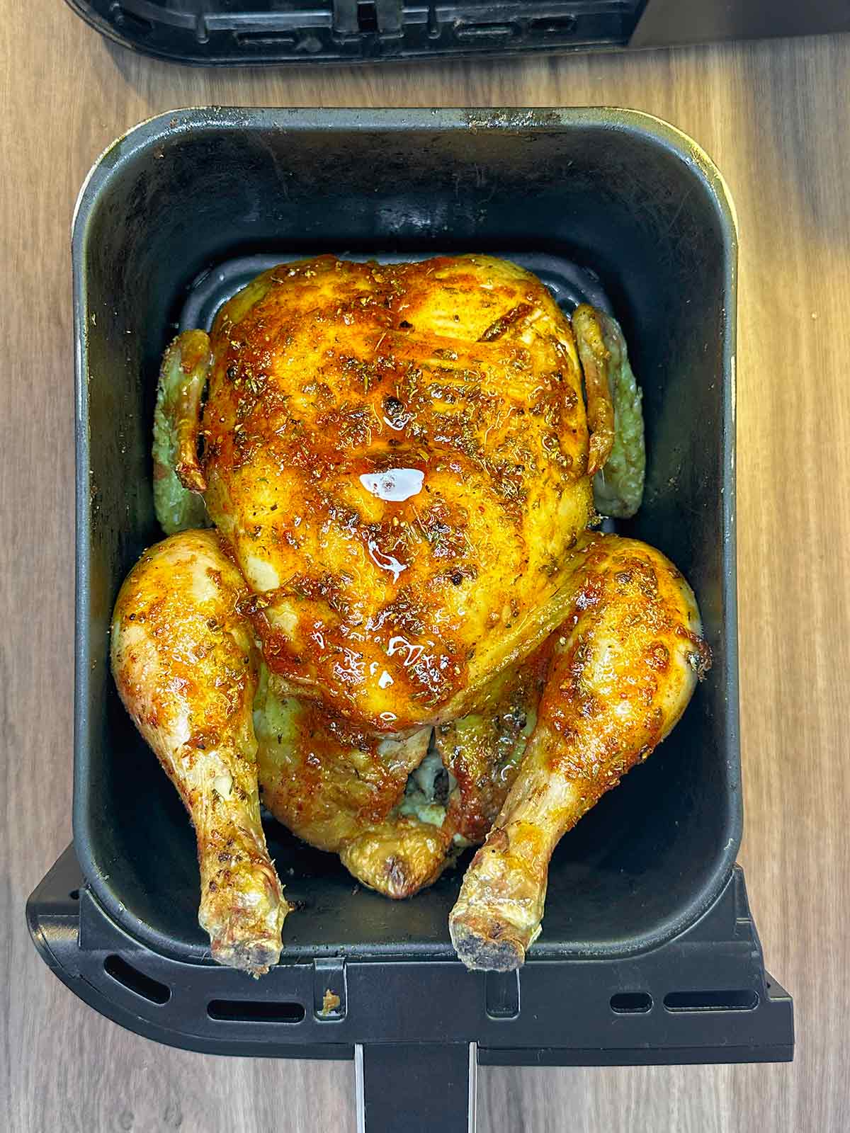 The remaining rub added to the chicken.