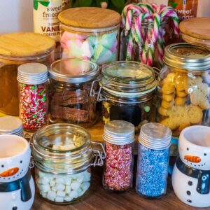 Jars of hot chocolate toppings making up a hot chocolate station.