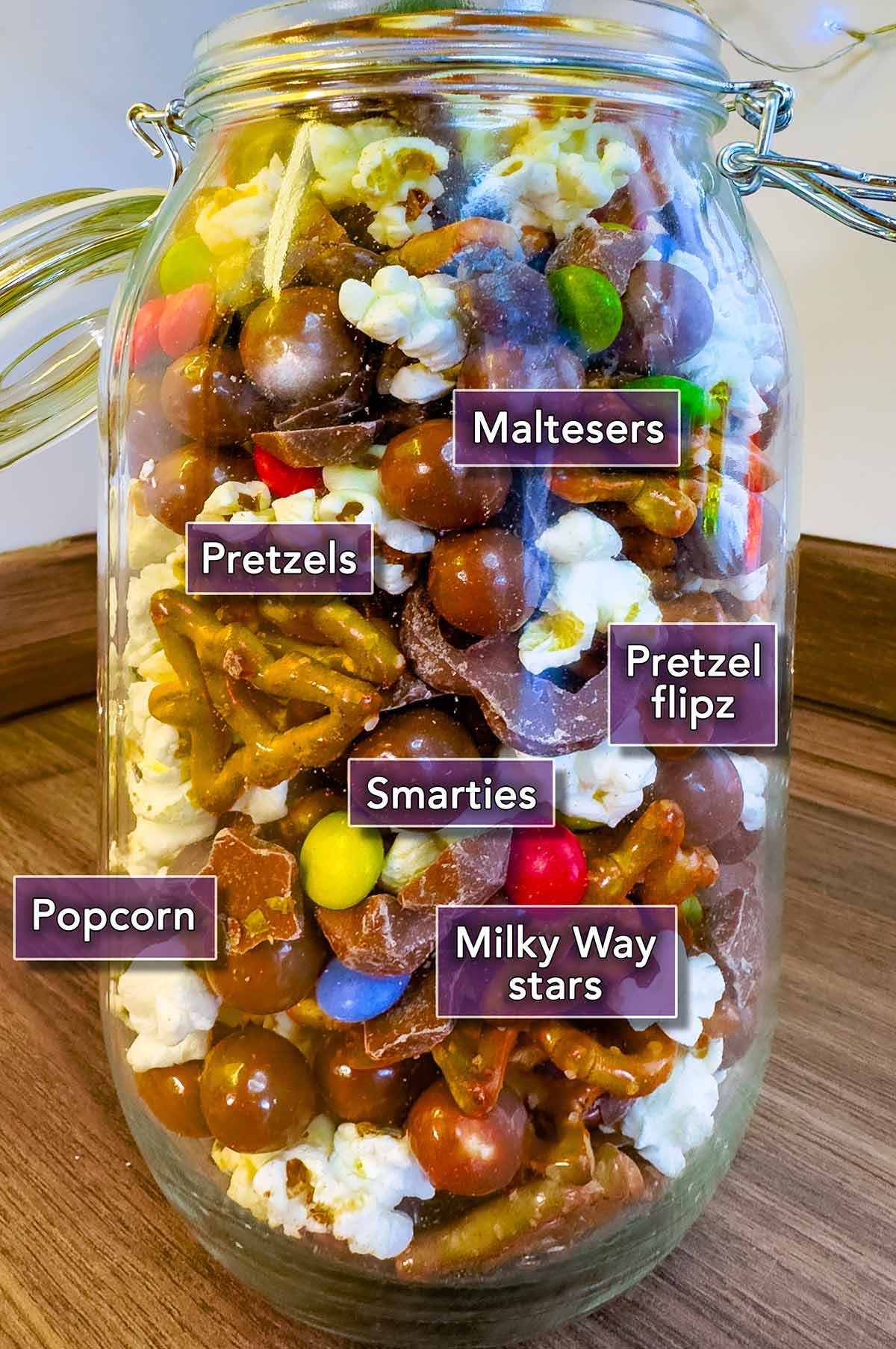 All the ingredients needed for this recipe in a jar, each has a text overlay label.