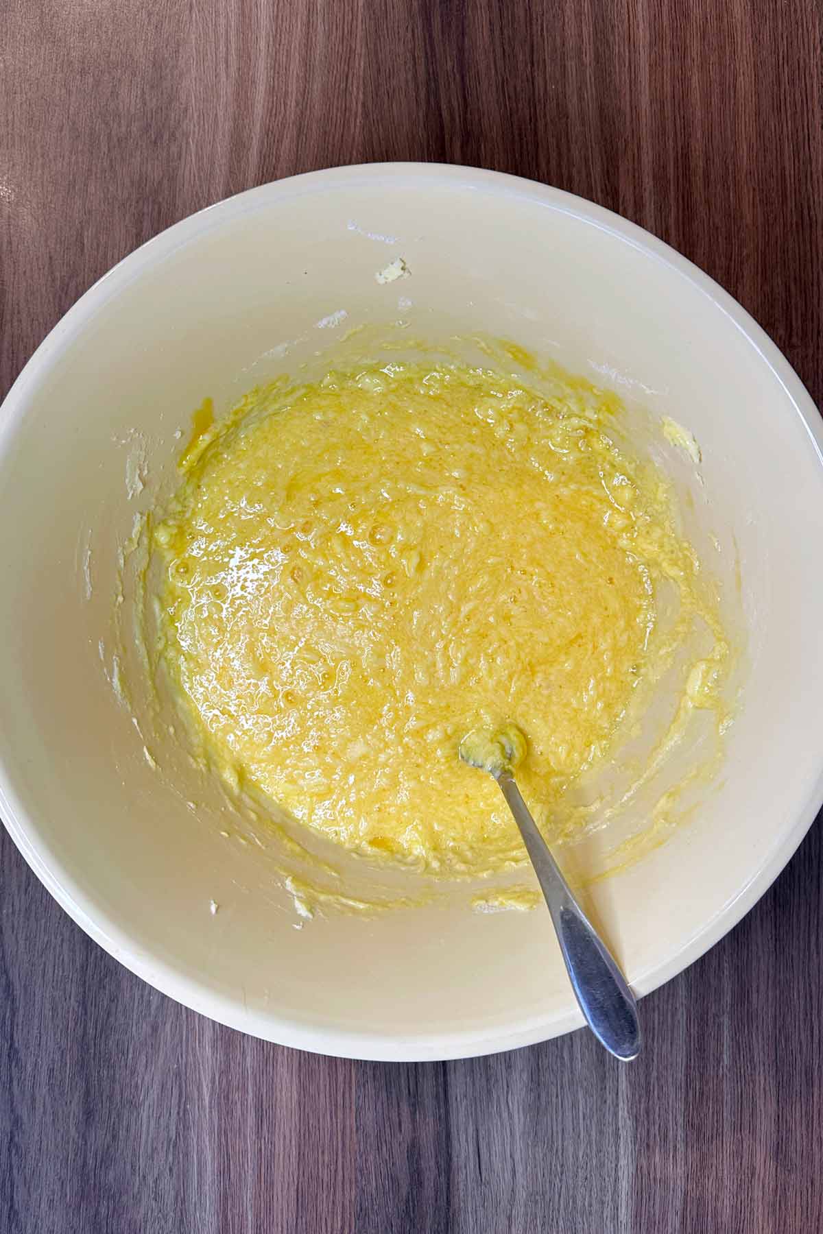 Eggs whisked into the mixture.