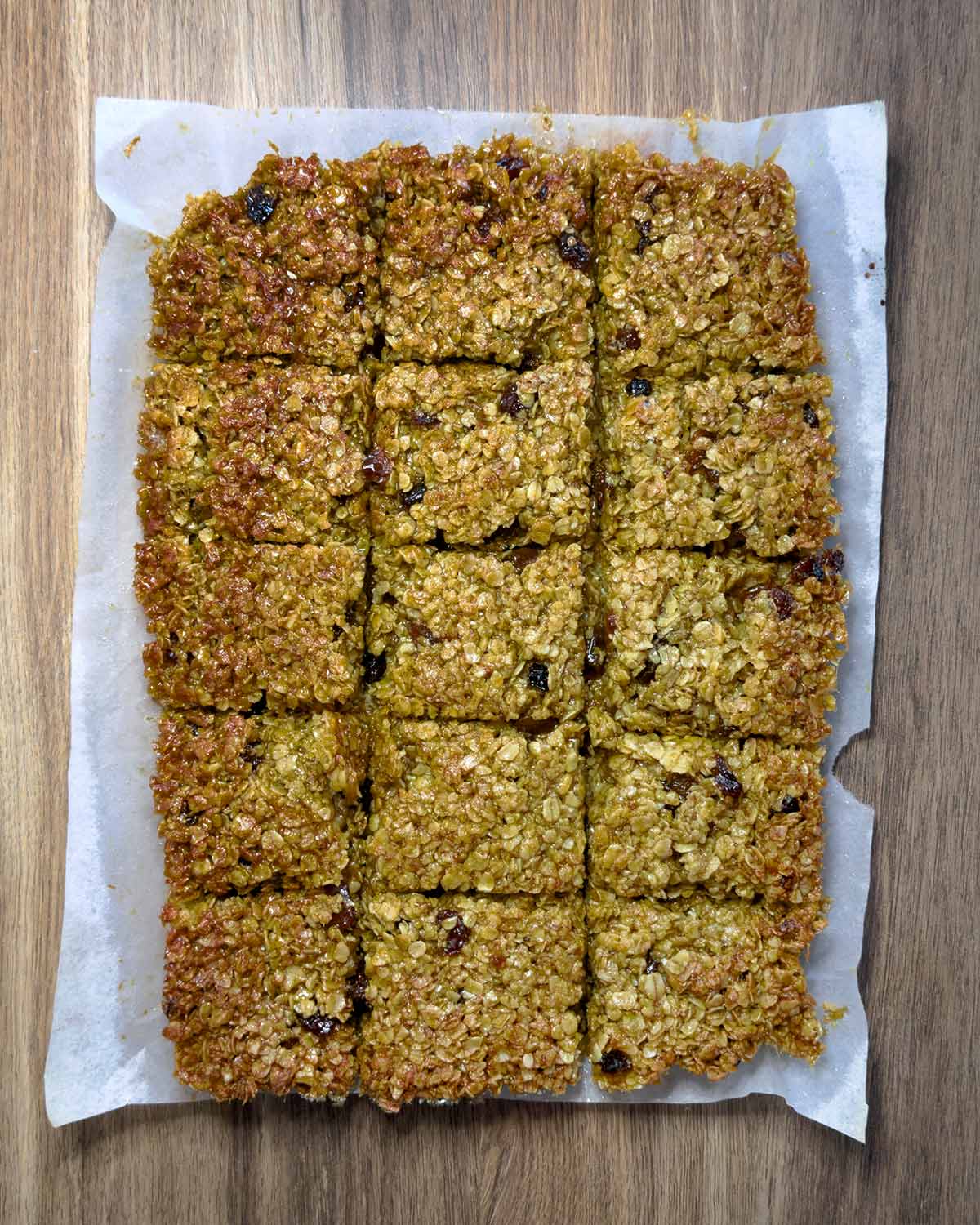 The cooked flapjacks cut into fifteen squares.