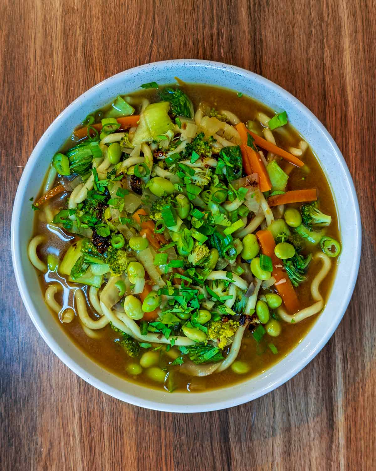 The noodles soup transferred to a bowl.