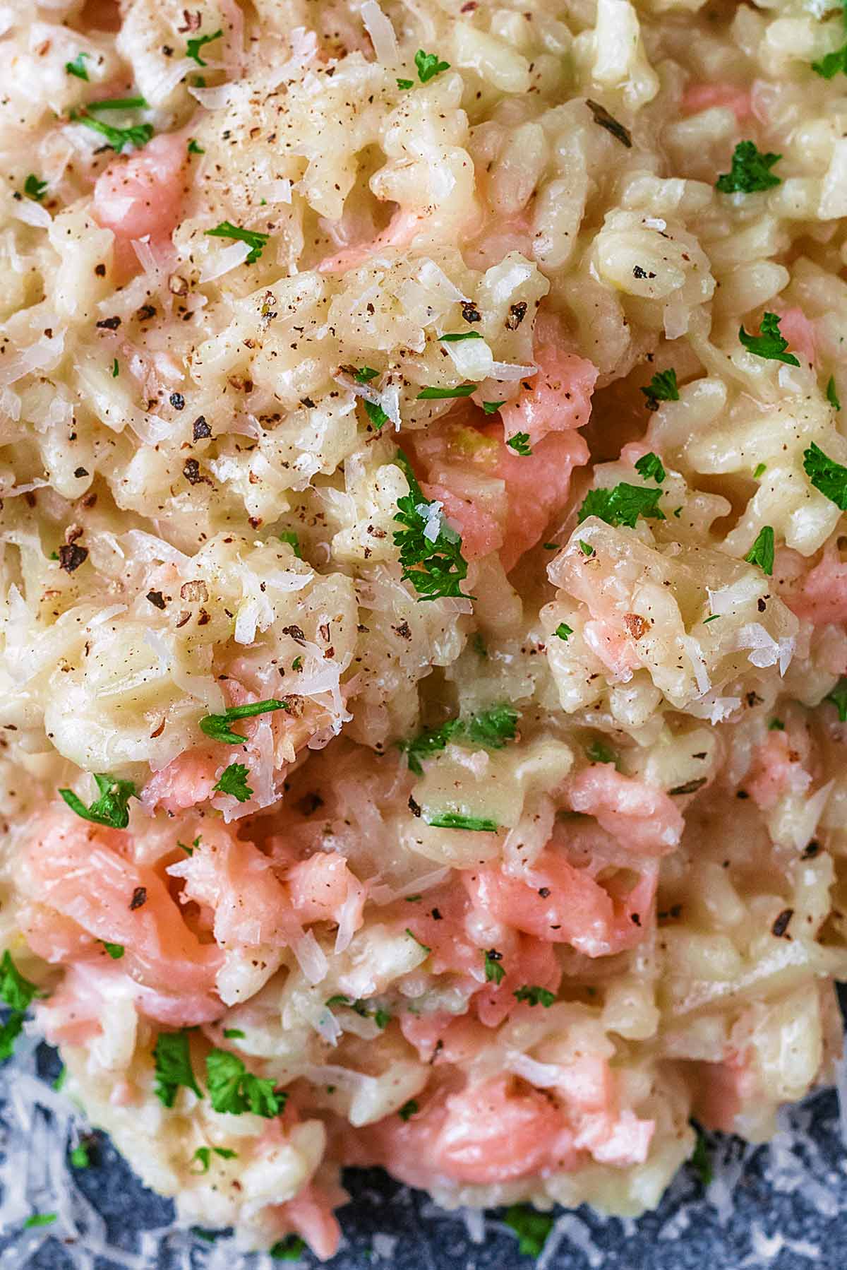 Smoked salmon and chopped herbs mixed into cooked risotto rice.