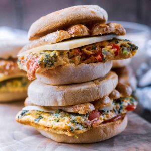 Two breakfast sandwiches stacked on top of each other.