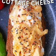 Scrambled eggs with cottage cheese with a text title overlay.