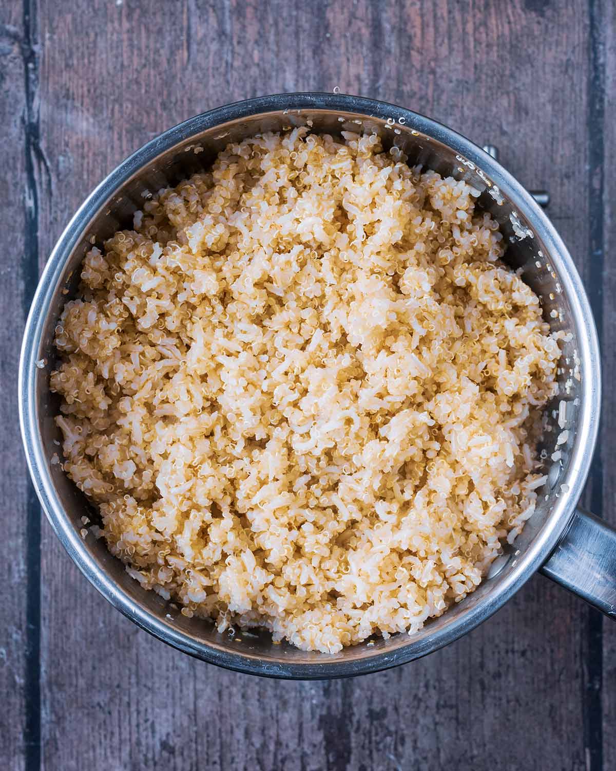 Cooked rice and quinoa in a saucepan.