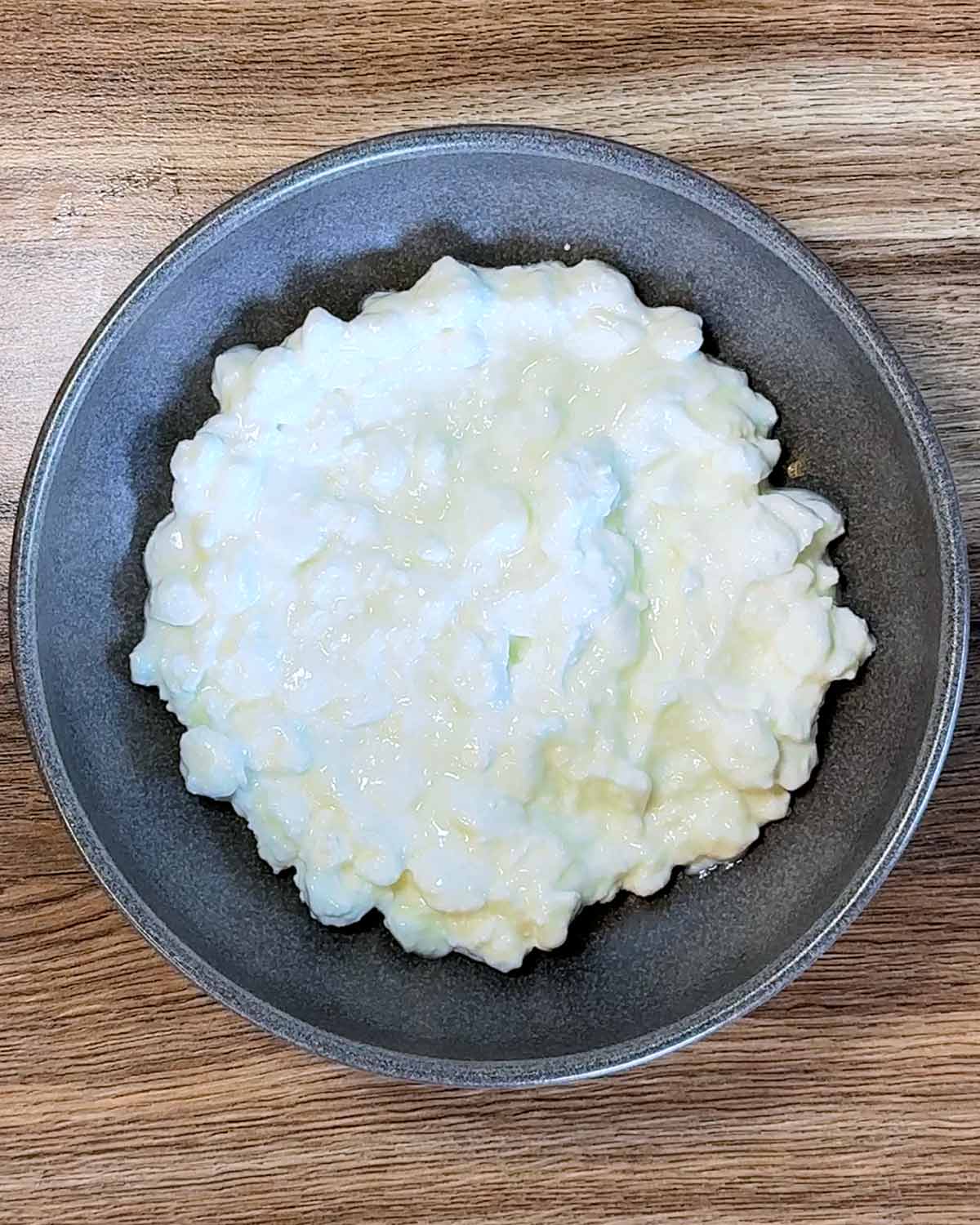 A bowl of cottage cheese.