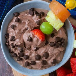 Chocolate Fruit Dip with a fruit skewer dipped into it.