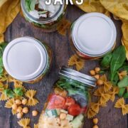 Pasta salad jars with a text title overlay.