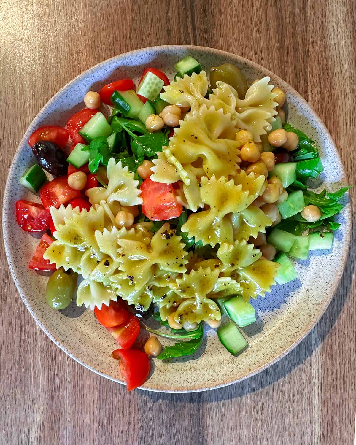 A plate of pasta salad.