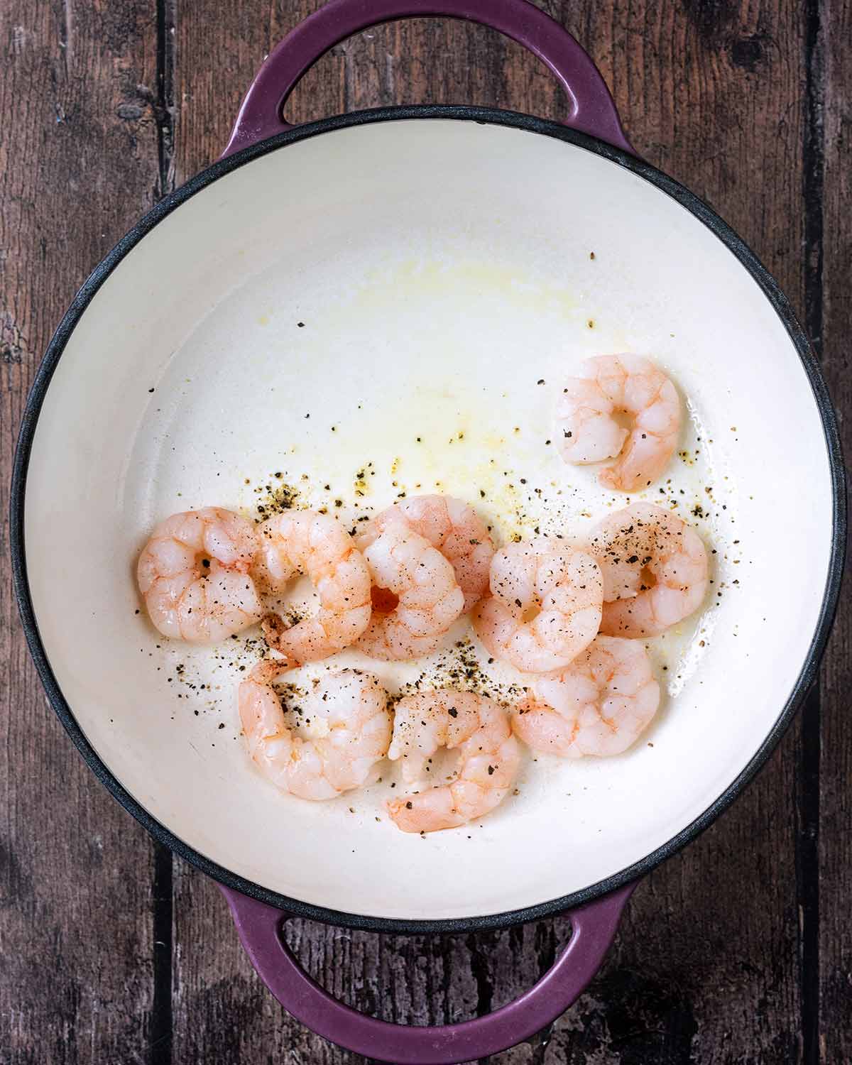 King prawns cooking in a pan.