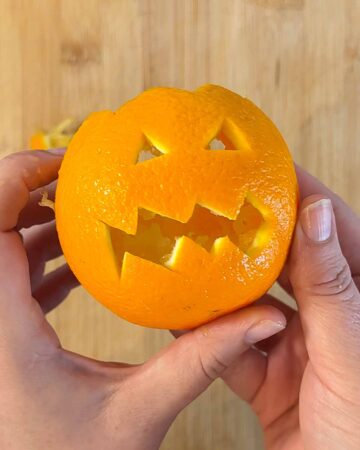 Jack-O-Lantern Orange Fruit Cups - Hungry Healthy Happy