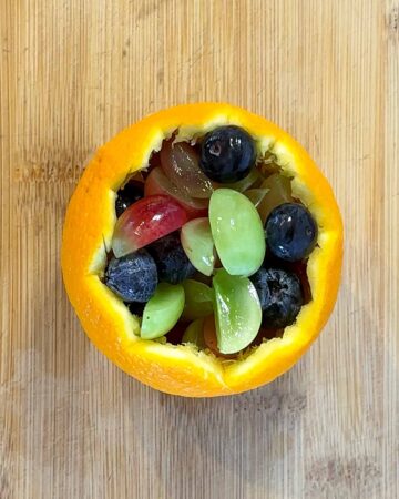 Jack-O-Lantern Orange Fruit Cups - Hungry Healthy Happy
