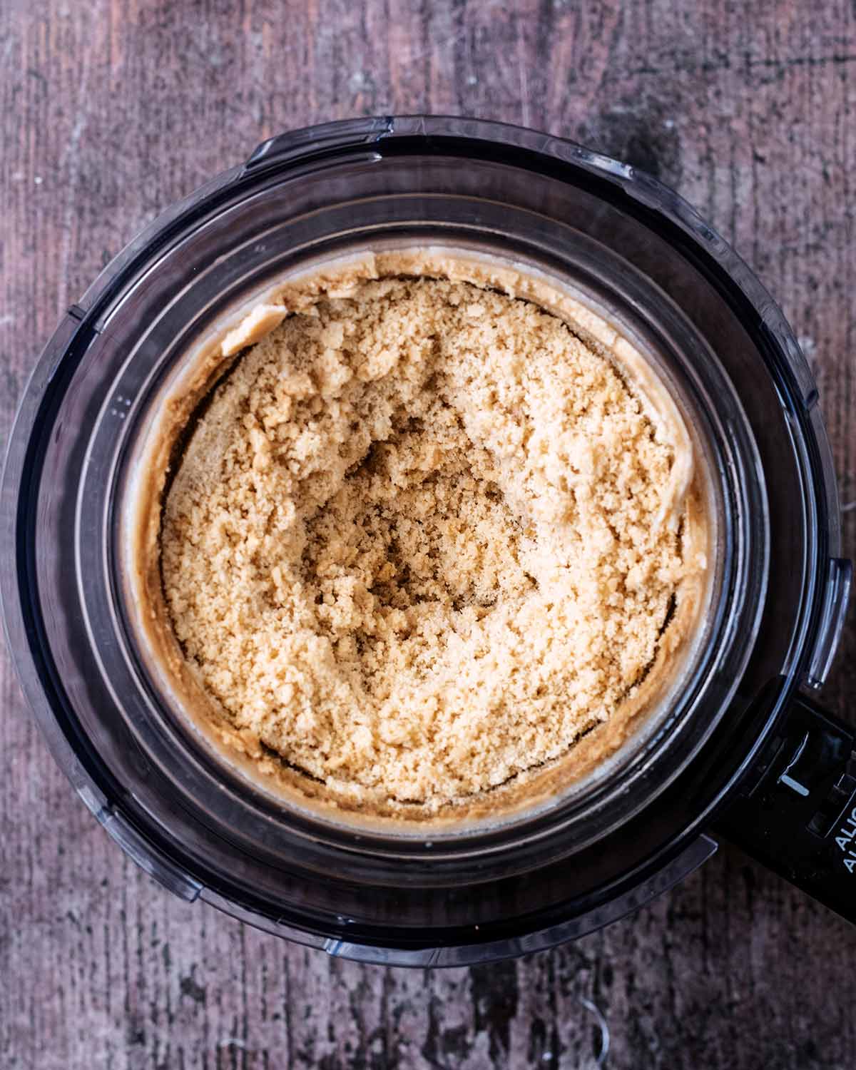 Half churned coffee ice cream in the tub.