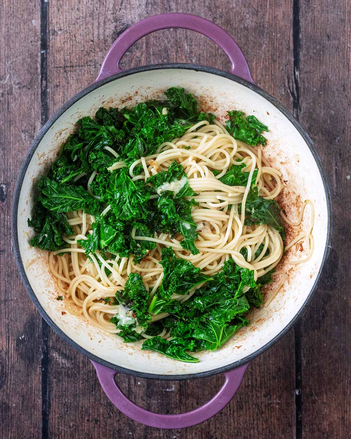 Drained pasta and Parmesan added to the kale.